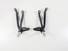 Load image into Gallery viewer, 2024 Triumph Street Triple 765 R Rear Passenger Footpeg Set T2088156 T2088157