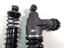 Load image into Gallery viewer, 2015 Harley Touring FLHXS Street Glide Rear Shock Set 54000081 54000082