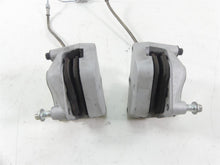 Load image into Gallery viewer, 2007 Harley Touring FLHR SE CVO Road King Front Brake Caliper Set 44381-99C