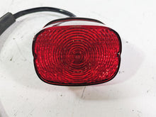 Load image into Gallery viewer, 2005 Harley Softail FLSTFSE CVO Fat Boy Tail Light Lamp Lens Taillight 68140-04