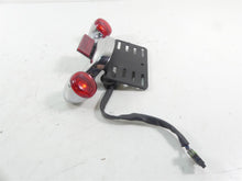 Load image into Gallery viewer, 2016 Harley Touring FLTRX Road Glide Rear Blinker Bar Plate Holder Set 73309-10