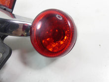 Load image into Gallery viewer, 2016 Harley Touring FLTRX Road Glide Rear Blinker Bar Plate Holder Set 73309-10