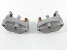 Load image into Gallery viewer, 2005 Harley Touring CVO FLHTCSE Electra Glide Front Brake Caliper Set 44382-99C