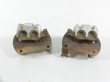 Load image into Gallery viewer, 2015 Can-Am Commander 1000XT Front Brake Caliper Set 705600678 705600679