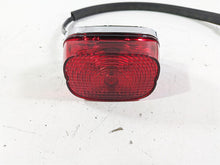 Load image into Gallery viewer, 2005 Harley Softail FLSTFSE CVO Fat Boy Tail Light Lamp Lens Taillight 68140-04