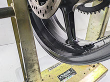 Load image into Gallery viewer, 2012 Triumph Daytona 675 17x5.5 Rear Wheel Rim Graphite T2010842