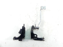 Load image into Gallery viewer, 2006 Harley Softail FXSTSI Springer Left Right Footpeg Mounts 33683-00 42507-00