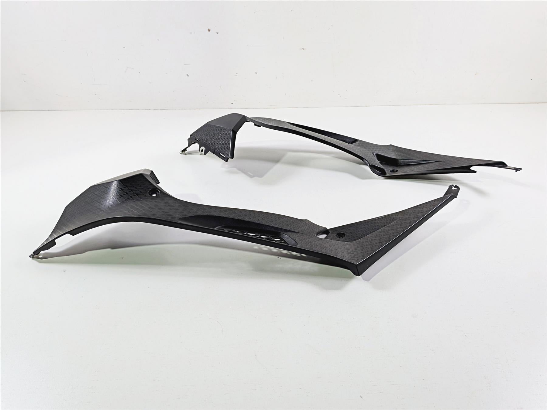 Pair of black motorcycle fairing side panels for sportbike, available at Mototech271