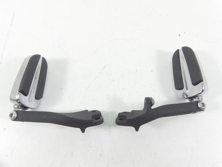 Pair of used motorcycle foot pegs with black rubber and chrome finish, available at Mototech271
