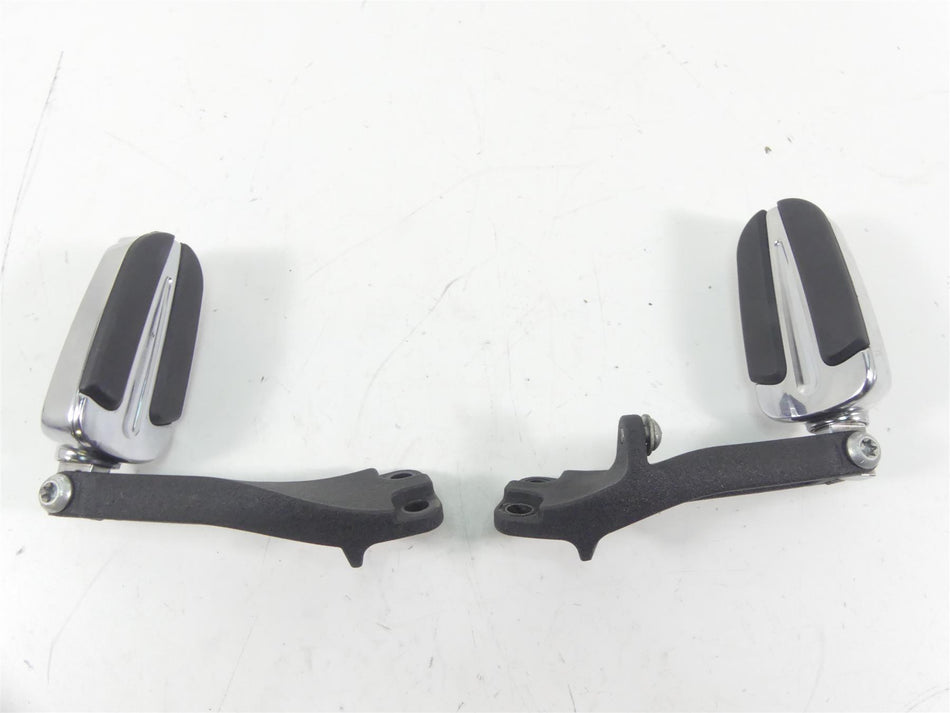 Pair of used motorcycle foot pegs with black rubber and chrome finish, available at Mototech271