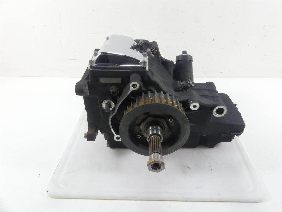Used motorcycle engine gearbox with visible gears and shaft on white background, available at Mototech271
