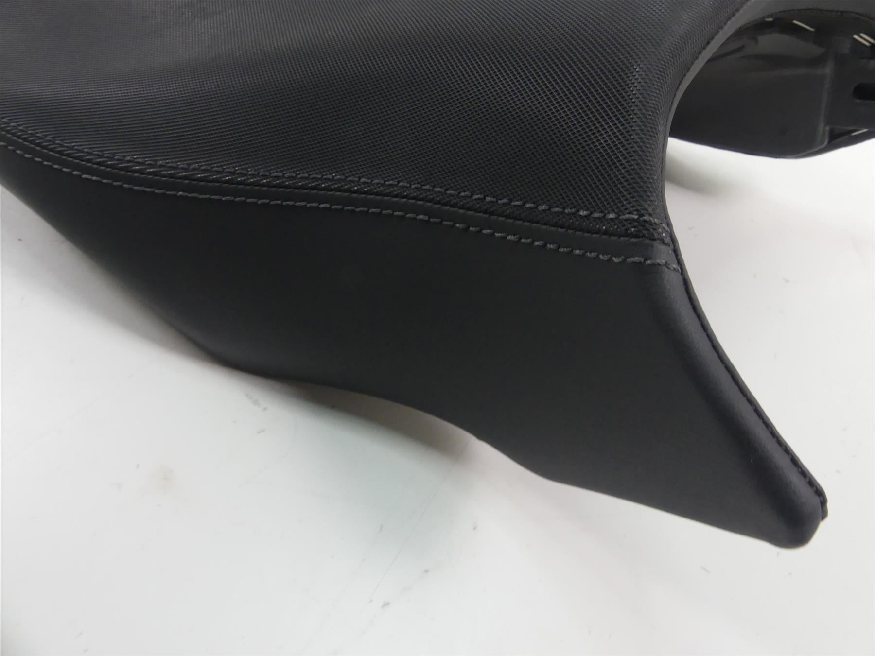 Black used motorcycle seat with detailed stitching, available at Mototech271