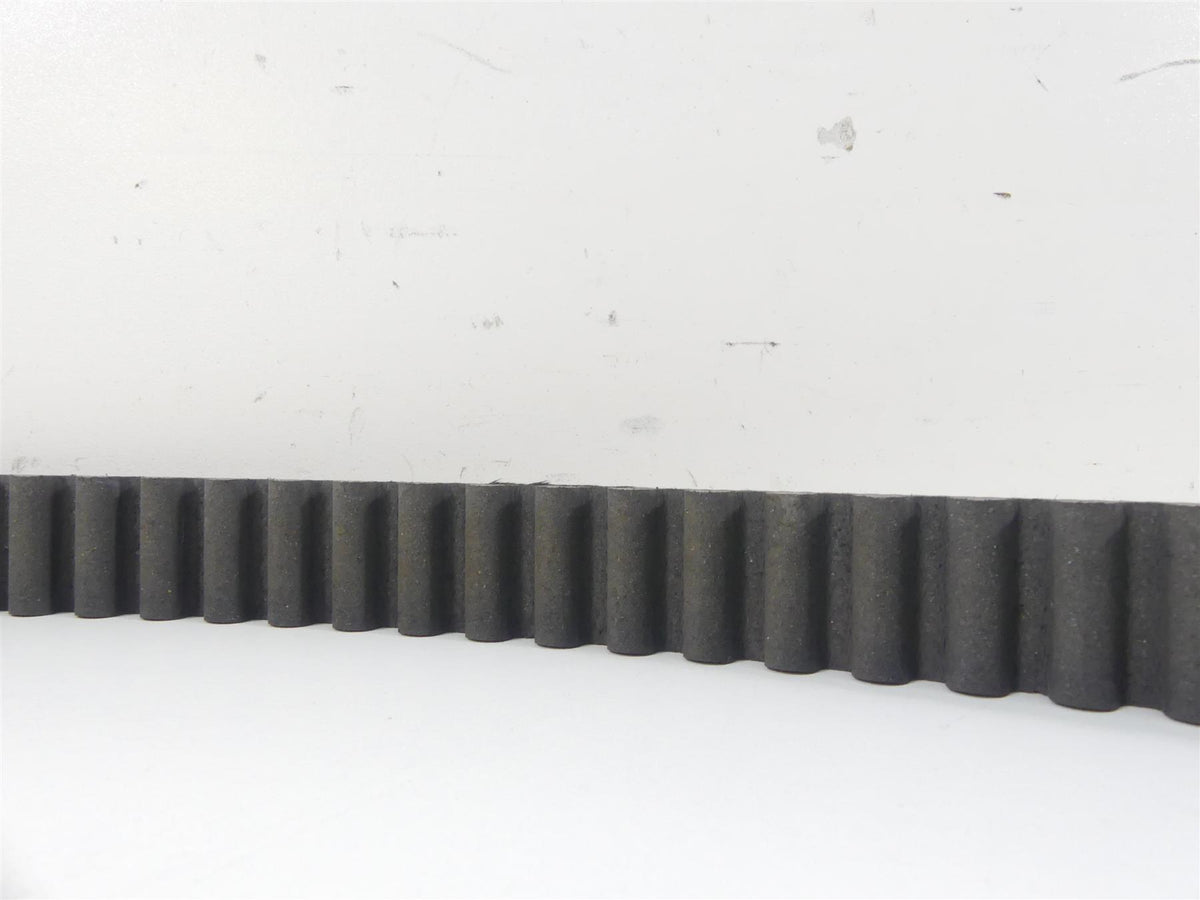 Close-up of used motorcycle drive belt with teeth, available at Mototech271