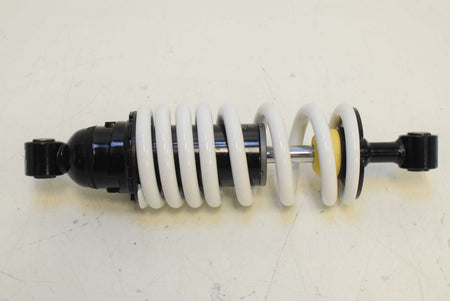 Black and white motorcycle rear shock absorber, used motorcycle part available at Mototech271