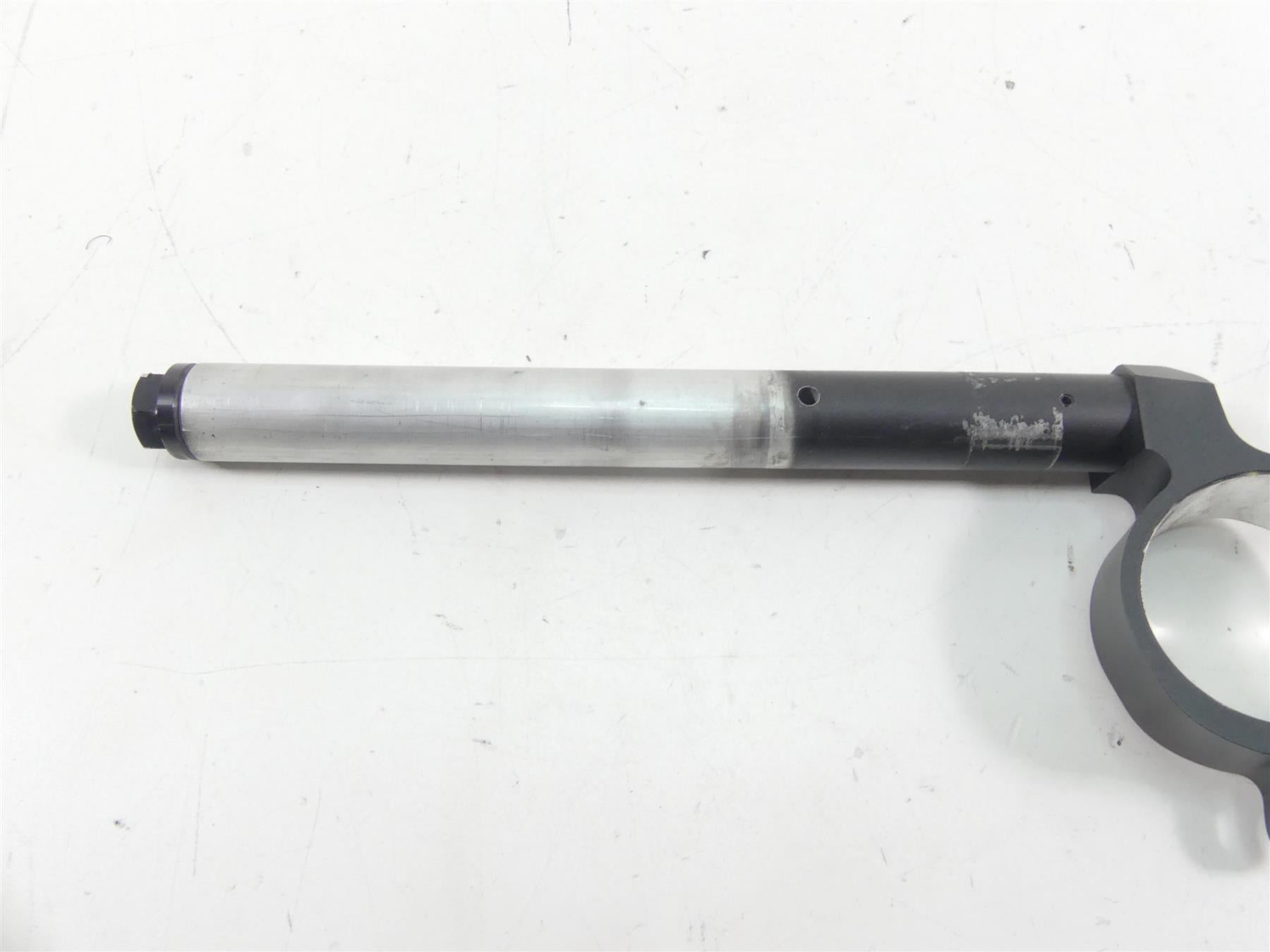 Used motorcycle clip-on handlebar part on white background, available at Mototech271