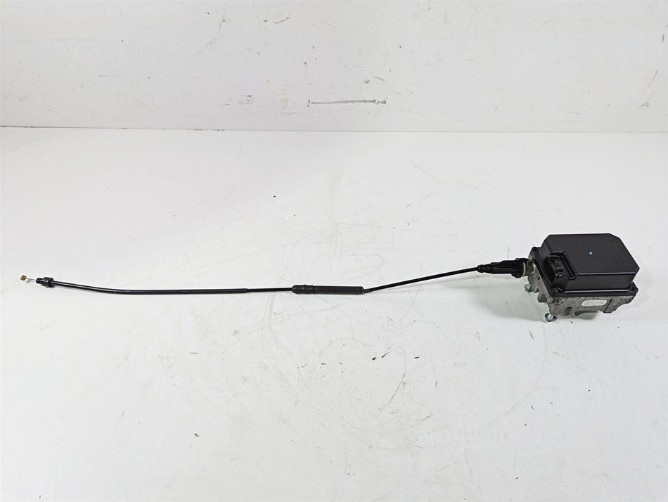 Used motorcycle control unit with attached cable on white background, available at Mototech271