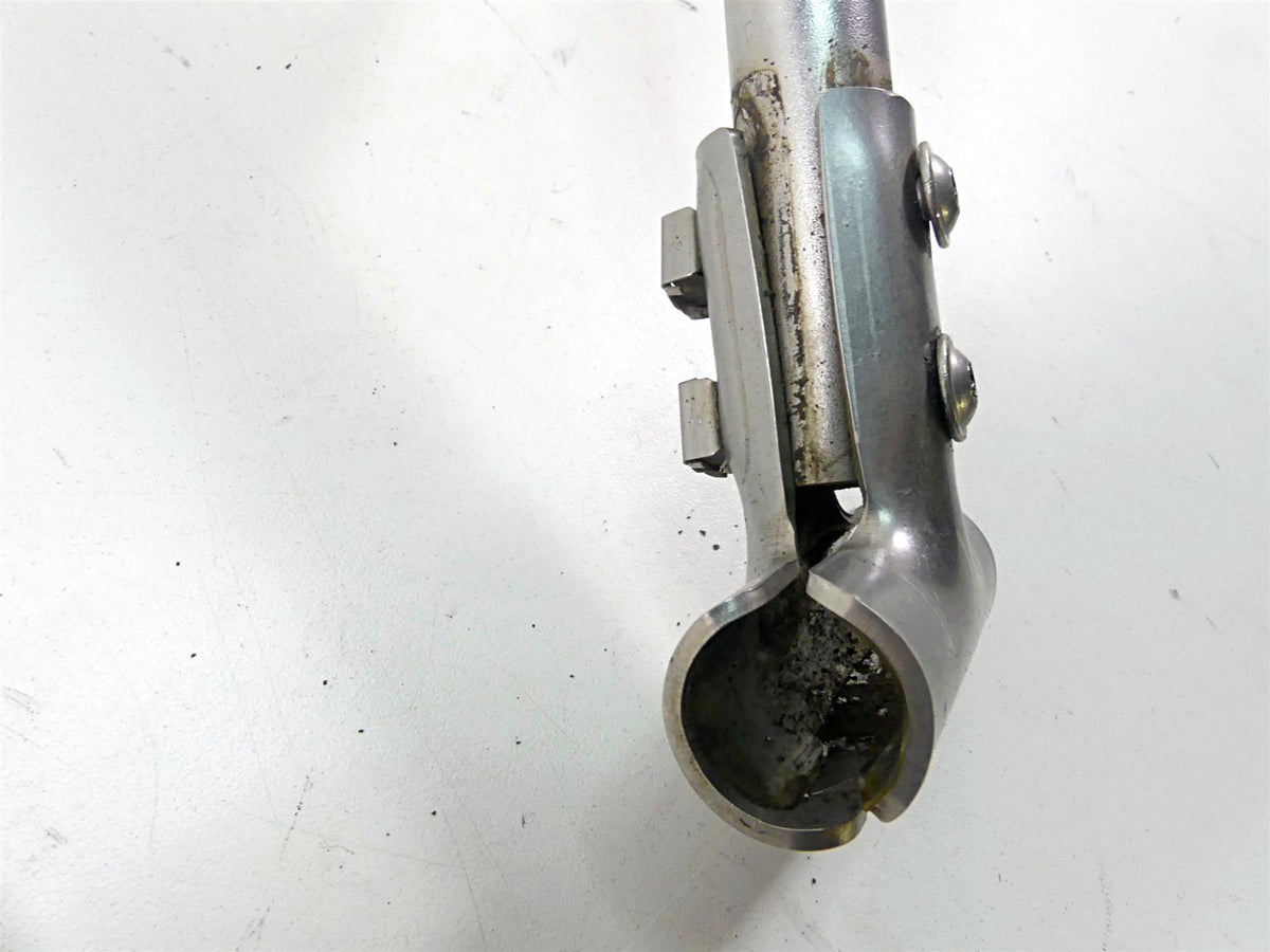 Used motorcycle handlebar clamp with bolts on white background, available at Mototech271