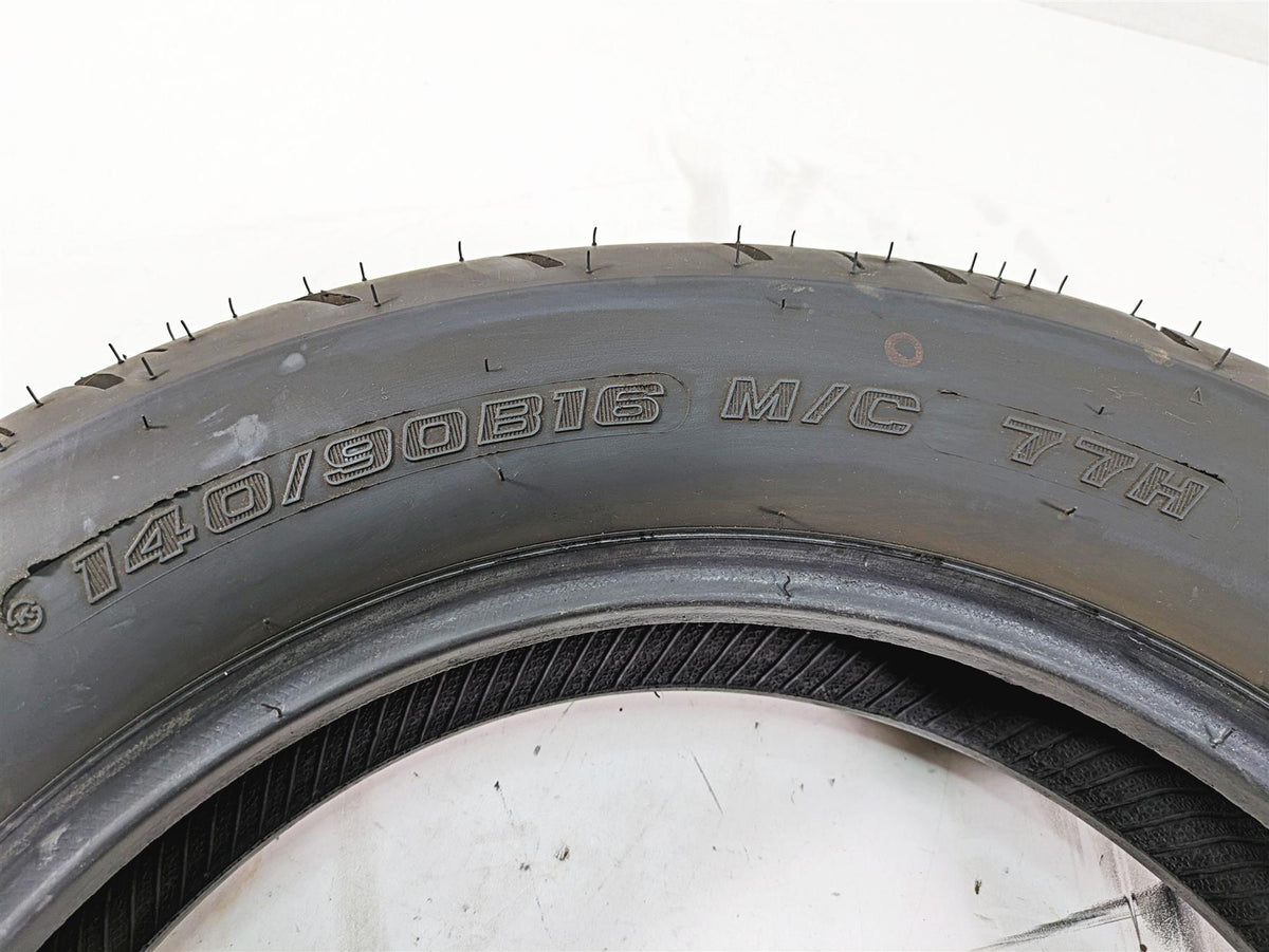 Used motorcycle tire 140/90B16 M/C 77H size, close-up tread detail, available at Mototech271