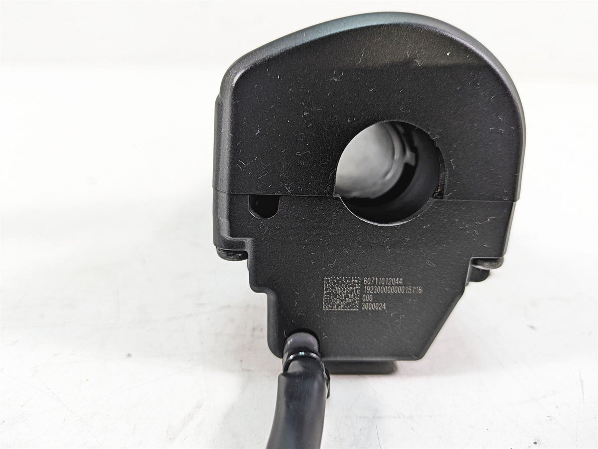Black motorcycle handlebar control switch close-up on white background, available at Mototech271