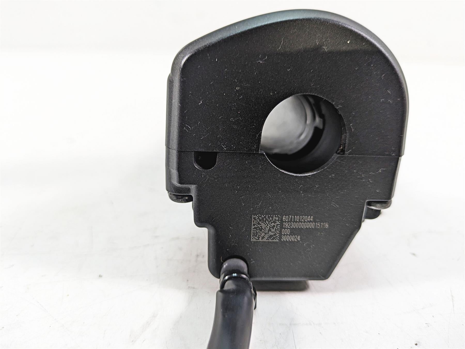 Black motorcycle handlebar control switch close-up on white background, available at Mototech271