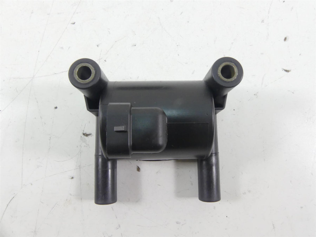 Used motorcycle ignition coil on white background, available at Mototech271