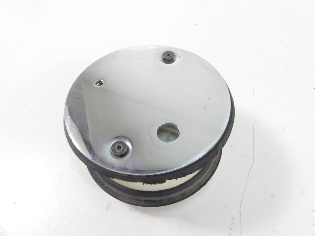 Used chrome motorcycle instrument cover with mounting holes, available at Mototech271