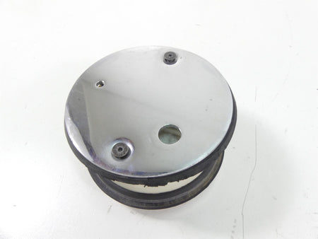 Used chrome motorcycle instrument cover with mounting holes, available at Mototech271