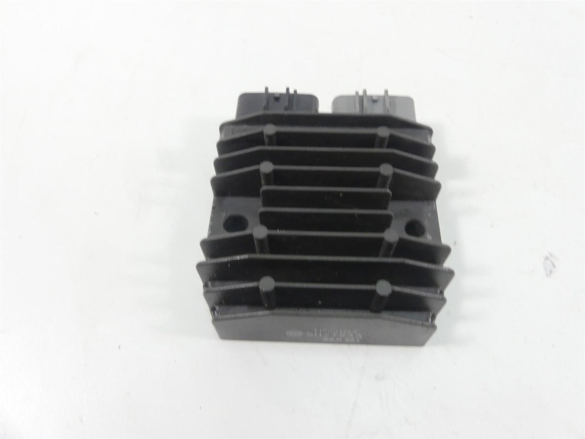 Used motorcycle regulator rectifier with cooling fins on white background, available at Mototech271