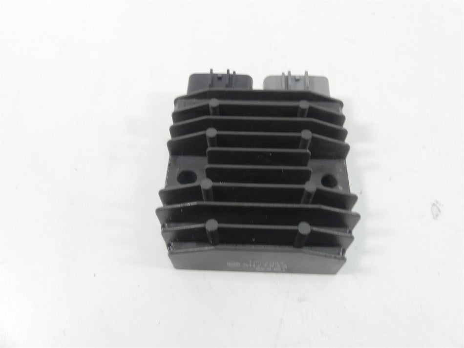Used motorcycle regulator rectifier with cooling fins on white background, available at Mototech271