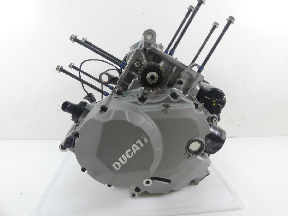 Used Ducati motorcycle engine part with visible mounting rods on white background, available at Mototech271