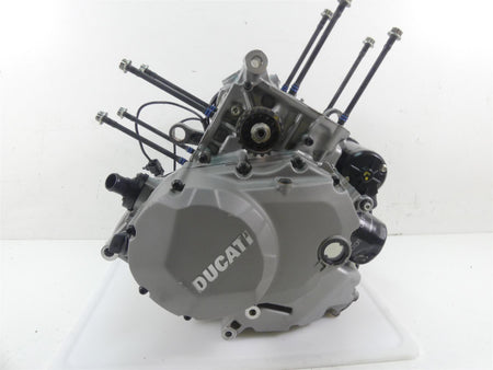 Used Ducati motorcycle engine part with visible mounting rods on white background, available at Mototech271