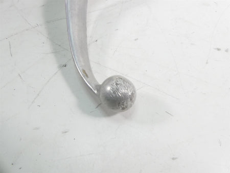 Used motorcycle brake or clutch lever tip with visible wear on white background, available at Mototech271