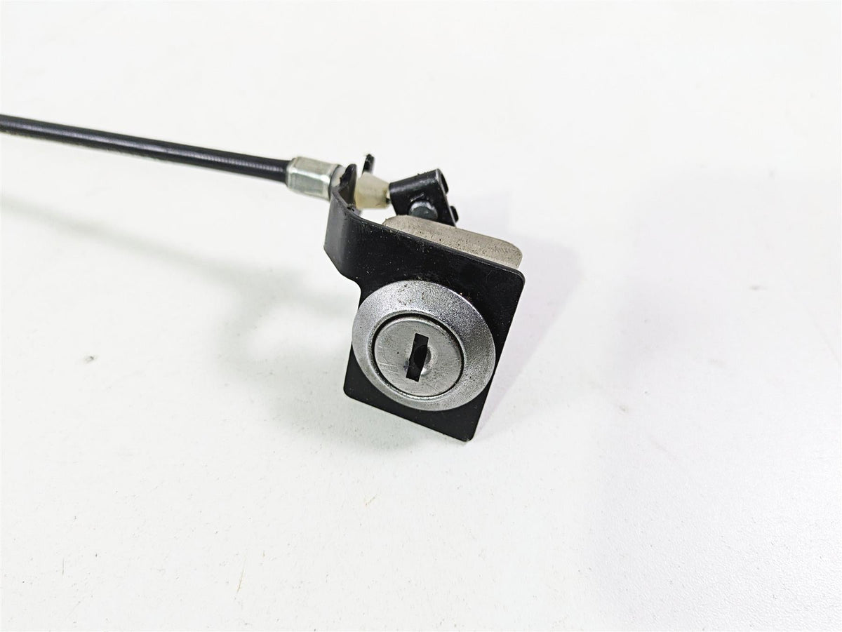 motorcycle seat lock assembly with cable on white background, available at Mototech271