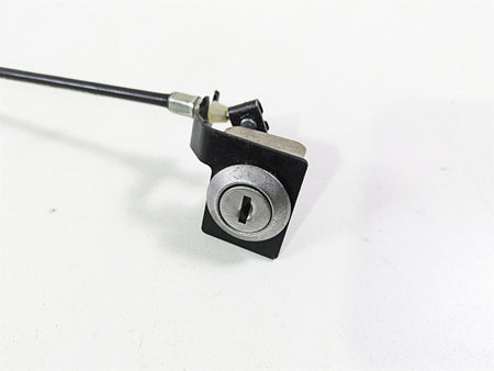 motorcycle seat lock assembly with cable on white background, available at Mototech271