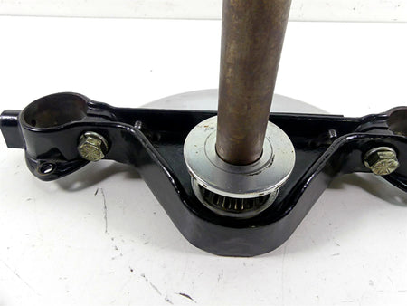 Used motorcycle triple tree clamp with bearings and bolts, available at Mototech271