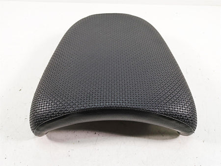 Black textured motorcycle seat cushion, used spare part, available at Mototech271