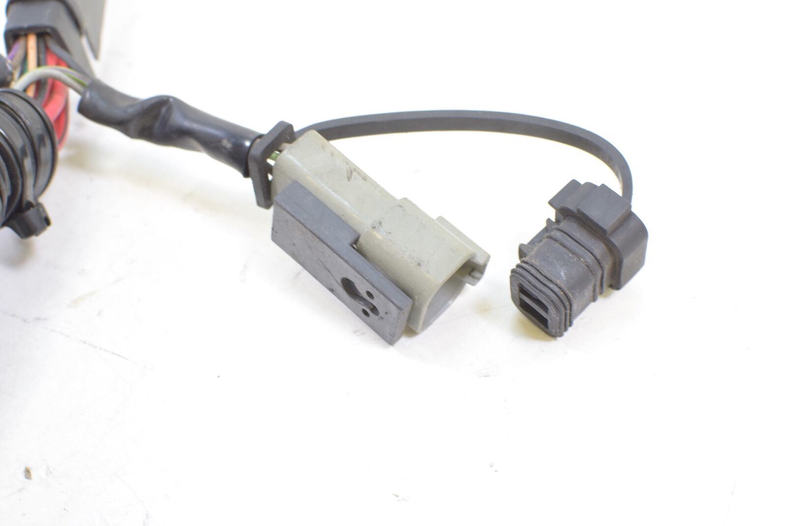 Used motorcycle electrical connector wiring harness on white background, available at Mototech271