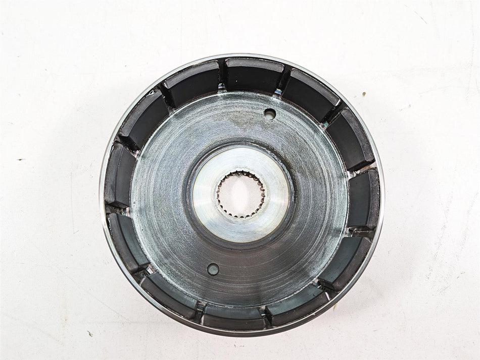 Used motorcycle flywheel rotor part for engine repair on white background, available at Mototech271