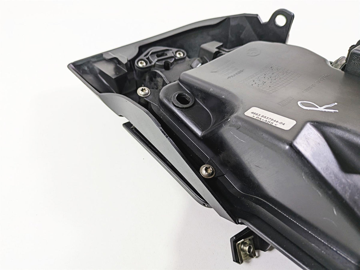 Used black motorcycle fairing panel with mounting hardware on white background, available at Mototech271