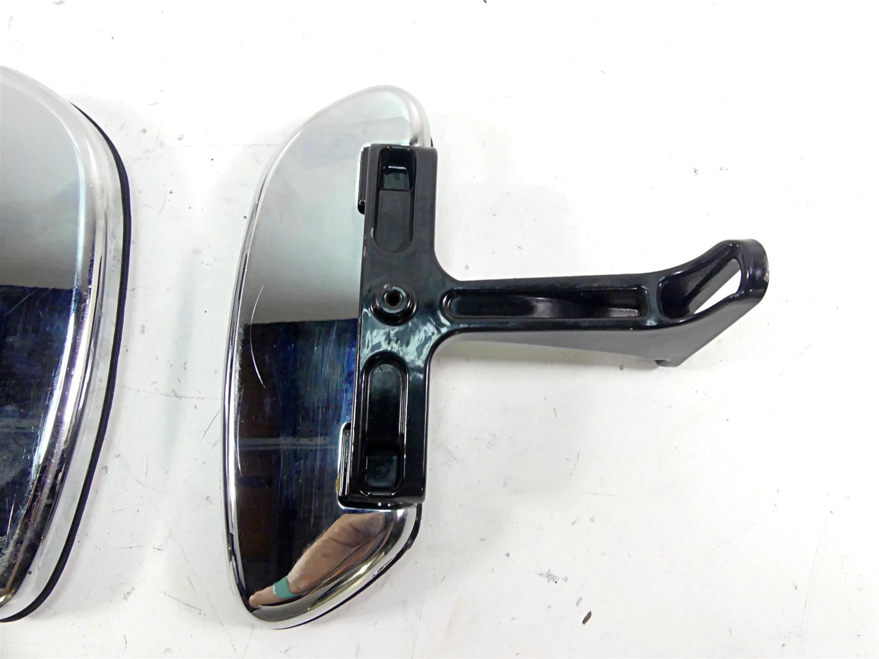 Used chrome motorcycle rearview mirror with black mounting bracket, available at Mototech271
