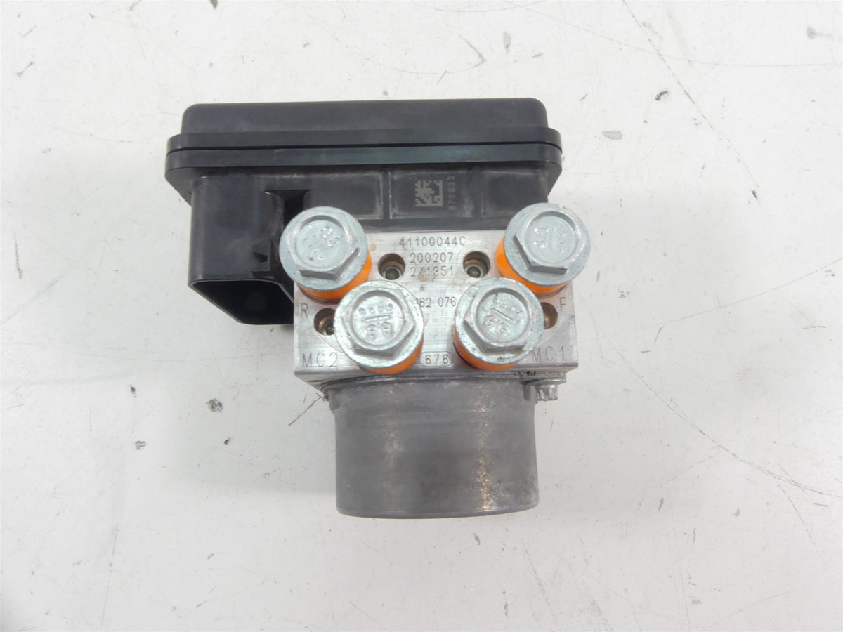 Used motorcycle ABS pump module with metal bolts and connector, available at Mototech271