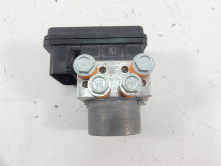 Used motorcycle ABS pump module with metal bolts and connector, available at Mototech271