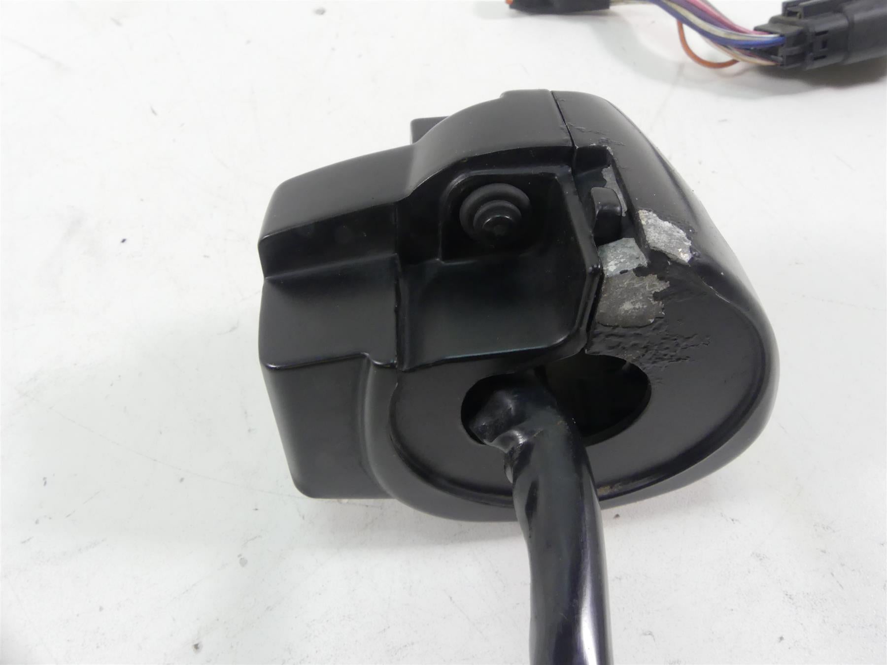 Used black motorcycle handlebar switch with visible wear, available at Mototech271
