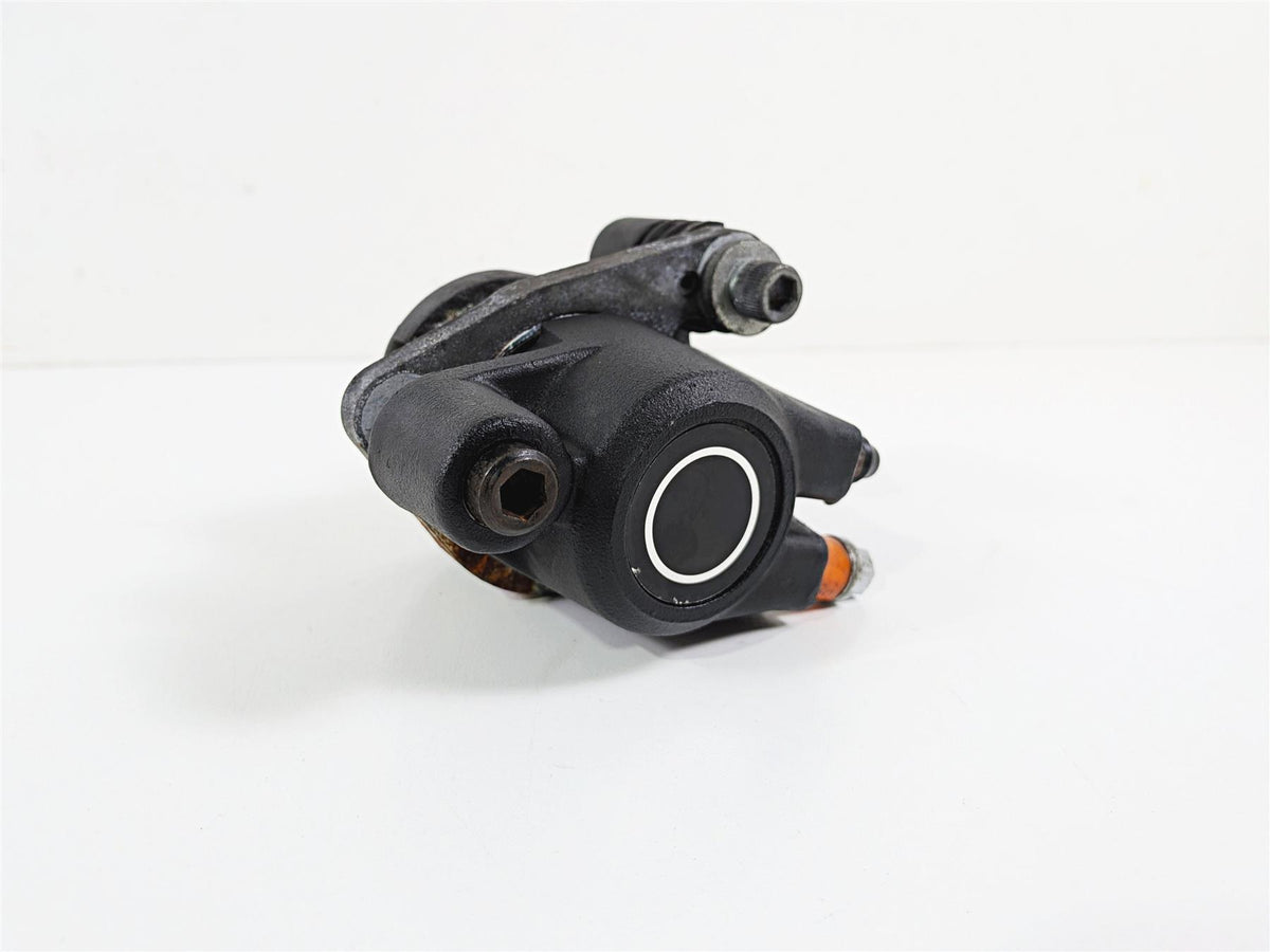used black motorcycle brake caliper on white background, available at Mototech271