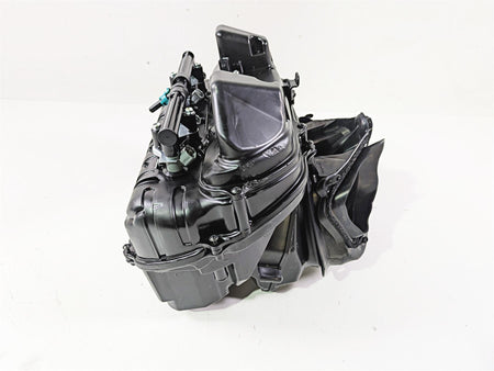 Black plastic motorcycle air intake box with fittings, available at Mototech271