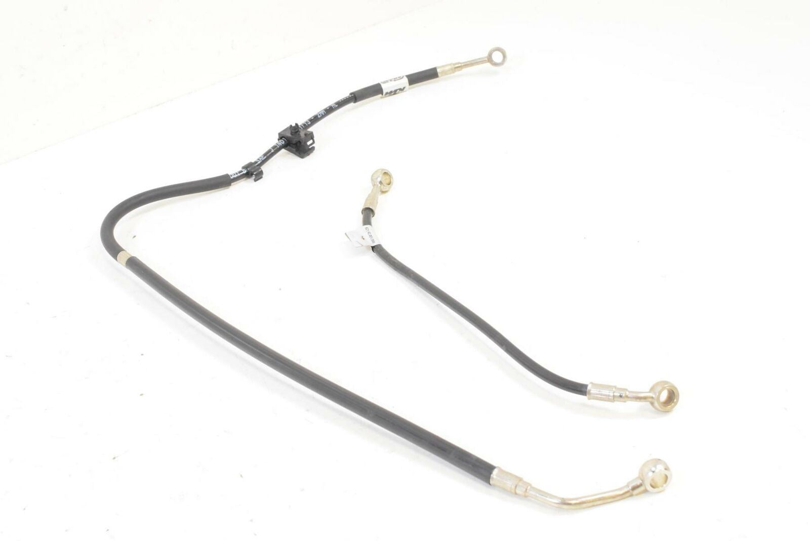 Used motorcycle brake lines with metal banjo fittings on white background, available at Mototech271