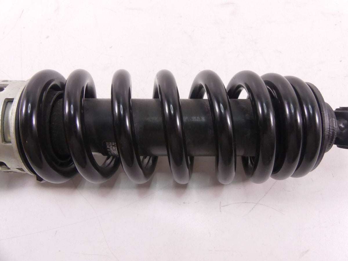 Black motorcycle shock absorber coil spring close-up, available at Mototech271