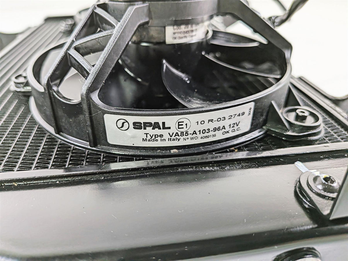 SPAL VA85-A103-96A 12V radiator cooling fan close-up on radiator, available at Mototech271