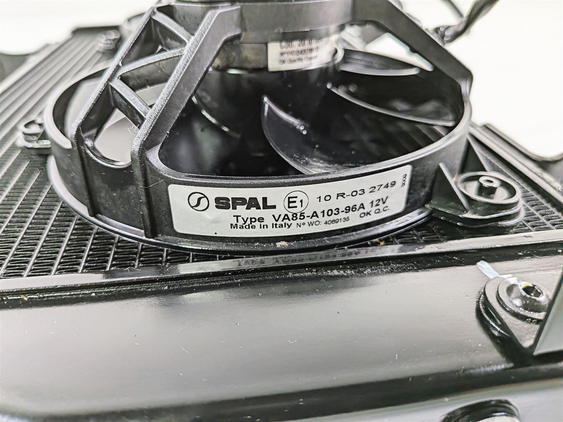 SPAL VA85-A103-96A 12V radiator cooling fan close-up on radiator, available at Mototech271