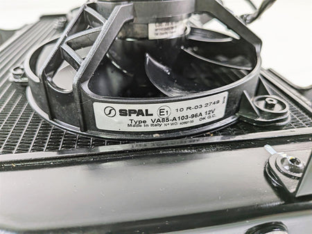 SPAL VA85-A103-96A 12V radiator cooling fan close-up on radiator, available at Mototech271